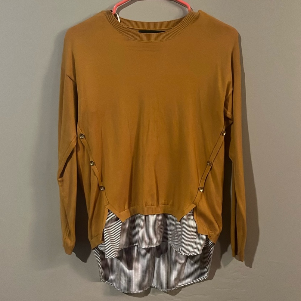 Yellow sweater, buttons down the side, bottom sewed in stripped fabric